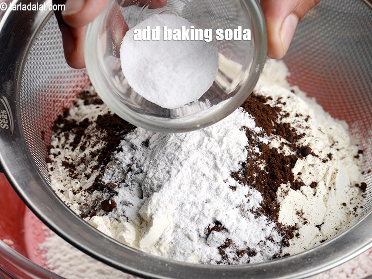 Step 16 – Add &frac14; tsp <a href="https://www.tarladalal.com/glossary-baking-soda-soda-bi-carb-615i">baking soda</a>.&nbsp;