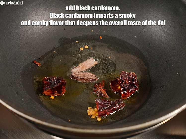 Step 12 – Add 1 <a href="https://www.tarladalal.com/glossary-black-cardamom-badi-elaichi-moti-elaichi-263i">black cardamom (badi elaichi)</a>. Black cardamom imparts a smoky and earthy flavor …