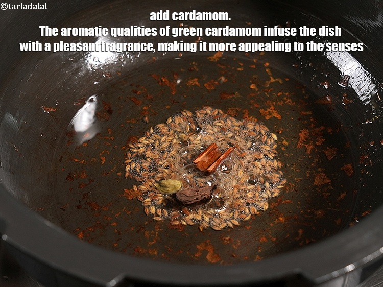 Step 12 – Add 1 <a href="https://www.tarladalal.com/glossary-cardamom-elaichi-262i">cardamom (elaichi)</a>. The aromatic qualities of green cardamom infuse the dish with …