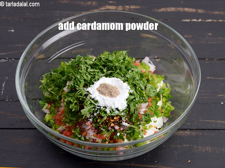 Step 12 – Add 1/8 tsp <a href="https://www.tarladalal.com/glossary-cardamom-powder-elaichi-powder-265i">cardamom (elaichi) powder</a>.