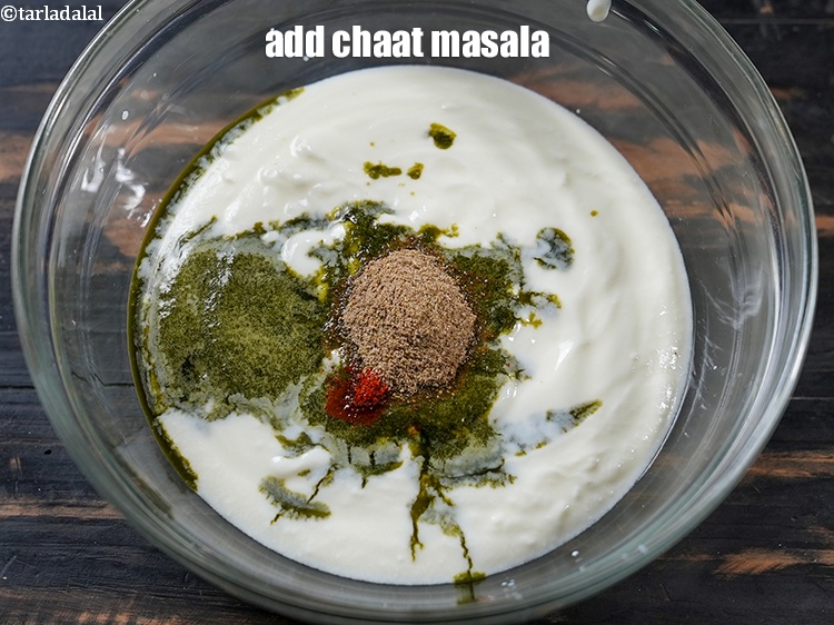 Step 14 – Add &frac12; tsp <a href="https://www.tarladalal.com/glossary-chaat-masala-300i">chaat masala</a>.