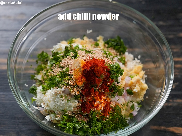 Step 12 – Add &frac12; tsp <a href="https://www.tarladalal.com/glossary-chilli-powder-red-chilli-powder-339i">chilli powder</a>.