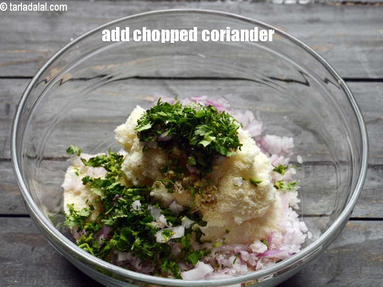 Step 12 – Add 2 tbsp <a href="https://www.tarladalal.com/glossary-chopped-coriander-783i">chopped coriander (dhania)</a>.