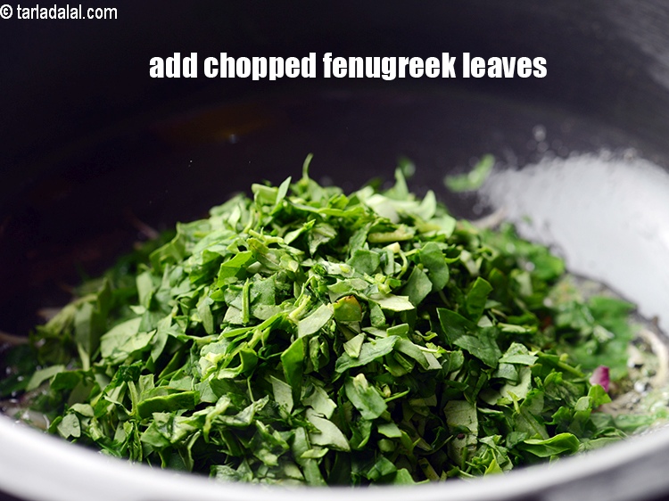 Step 12 – Add 3/4 cup&nbsp;<a href="https://www.tarladalal.com/glossary-chopped-fenugreek-811i">chopped fenugreek leaves (methi)</a>&nbsp;leaves.