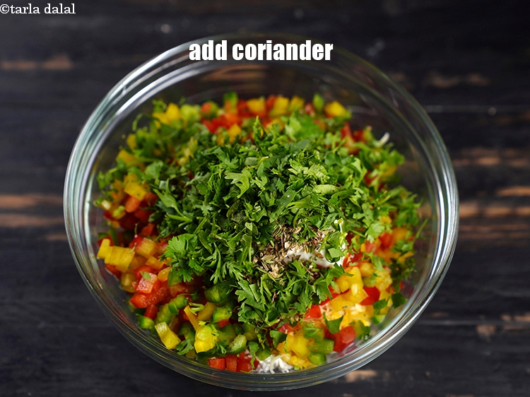 Step 12 – Add 2 tbsp finely <a href="https://www.tarladalal.com/glossary-chopped-coriander-783i">chopped coriander (dhania)</a>.