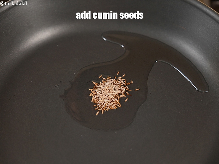Step 13 – Add &frac12; tsp <a href="https://www.tarladalal.com/glossary-cumin-seeds-jeera-zeera-381i">cumin seeds (jeera)</a>.