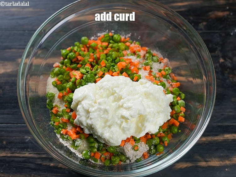 Step 12 – Add &frac34; cup <a href="https://www.tarladalal.com/glossary-curd-dahi-yogurt-yoghurt-383i">curd (dahi)</a>.