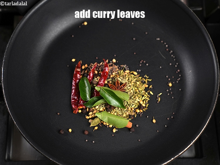 Step 12 – Add 3 to 4 curry leaves (kadipatta).