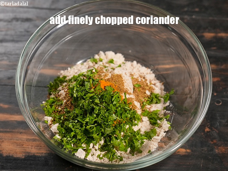 Step 12 – Add 2 tbsp finely&nbsp;<a href="https://www.tarladalal.com/glossary-chopped-coriander-783i">chopped coriander (dhania)</a>.