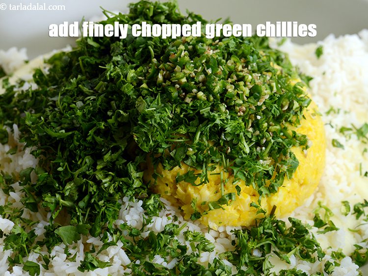 Step 12 – Add 2 tbsp finely <a href="https://www.tarladalal.com/glossary-chopped-green-chilli-820i">chopped green chillies</a>.&nbsp;