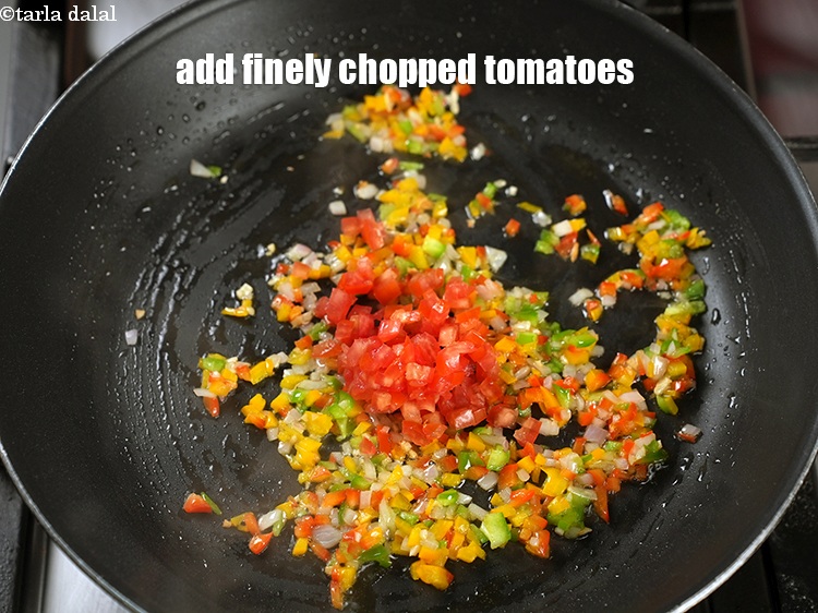 Step 12 – Add 2 tbsp <a href="https://www.tarladalal.com/glossary-chopped-tomatoes-779i">deseeded and finely chopped tomatoes</a>.