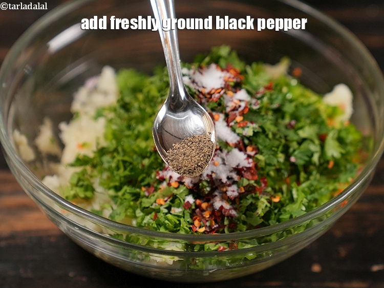 Step 12 – Add <a href="https://www.tarladalal.com/glossary-freshly-ground-black-pepper-kalimirch-powder-kali-mirch-ka-powder-567i">freshly ground black pepper</a>&nbsp;.