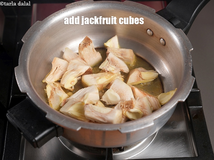 Step 12 – Add 2 cups <a href="https://www.tarladalal.com/glossary-jackfruit-cubes-2385i">jackfruit (kathal / phanas) cubes</a>.
