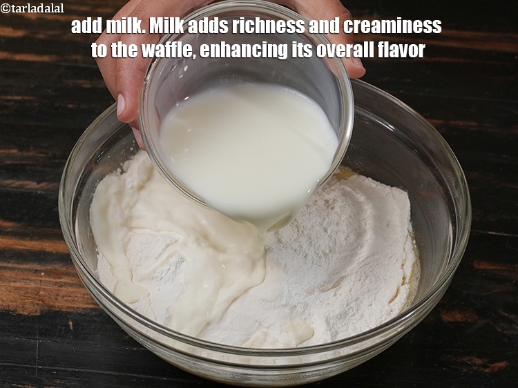 Step 11 – Add 1 cup <a href="https://www.tarladalal.com/glossary-milk-doodh-full-cream-milk-514i">milk</a>. Milk adds richness and creaminess to the waffle, enhancing its …