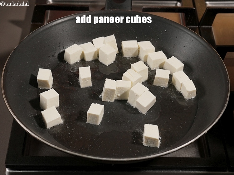 Step 12 – Add 1 cup <a href="https://www.tarladalal.com/glossary-paneer-cubes-cottage-cheese-cubes-1002i">paneer (cottage cheese) cubes</a>.