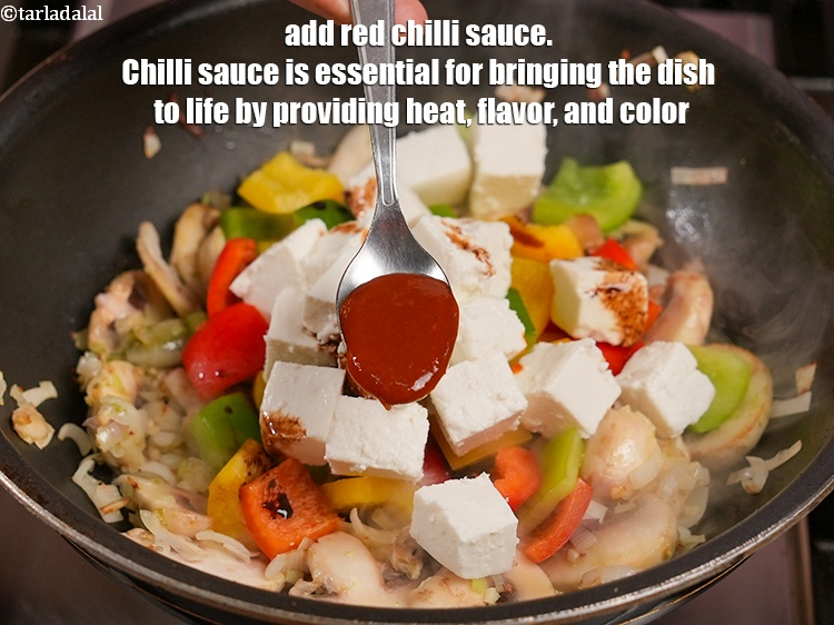 Step 12 – Add 1 tsp <a href="https://www.tarladalal.com/glossary-red-chilli-sauce-lal-chilli-sauce-810i">red chilli sauce</a>. Chilli sauce is essential for bringing the dish …