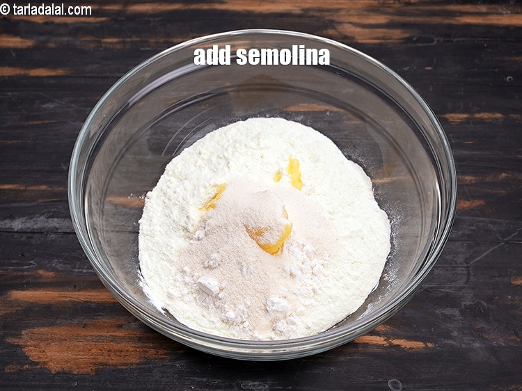 Step 13 – Add 1 tbsp fine&nbsp;<a href="https://www.tarladalal.com/glossary-semolina-sooji-rava-rawa-603i">semolina (rava / sooji)</a>. It is very important to use fine …