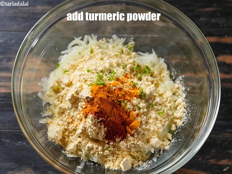 Step 12 – Add &frac14; tsp <a href="https://www.tarladalal.com/glossary-turmeric-powder-haldi-645i">turmeric powder (haldi)</a>.