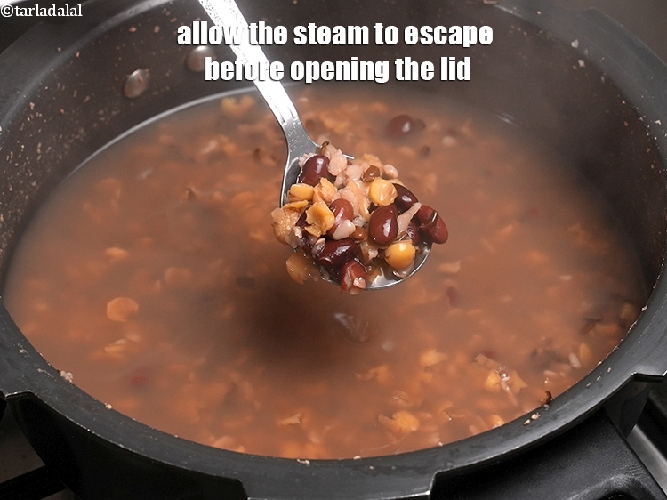 Step 12 – <p>Allow the steam to escape before opening the lid.</p>