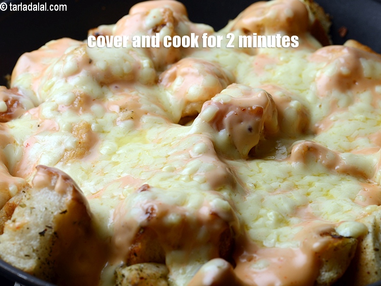 Step 13 – Cover with a lid and cook on a medium flame for 2 minutes.&nbsp;