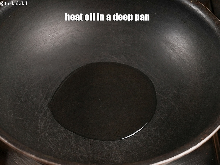 Step 12 – Heat 2 tbsp oil in a deep pan.