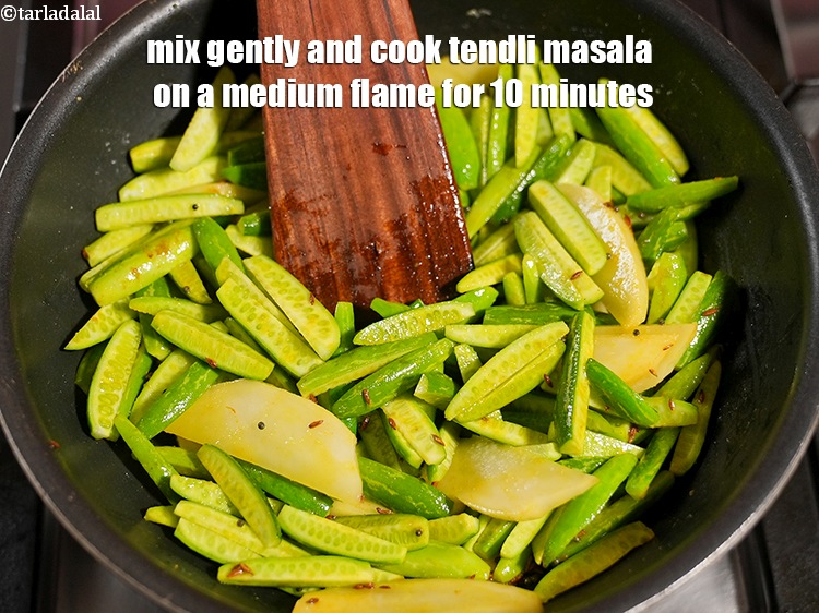 Step 12 – Mix gently and cook <strong>tendli batata nu shaak recipe | aloo tendli sabzi | Gujarati …