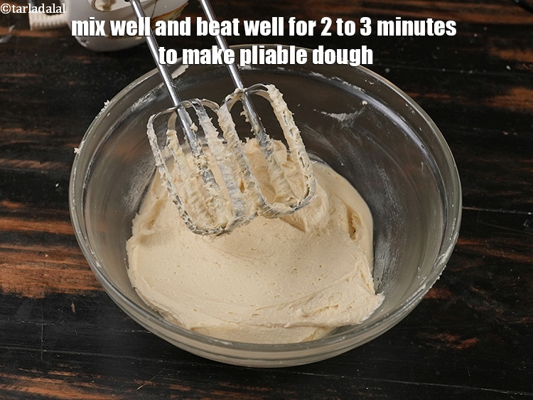 Step 12 – Mix well and beat well for 2 to 3 minutes to make pliable dough.