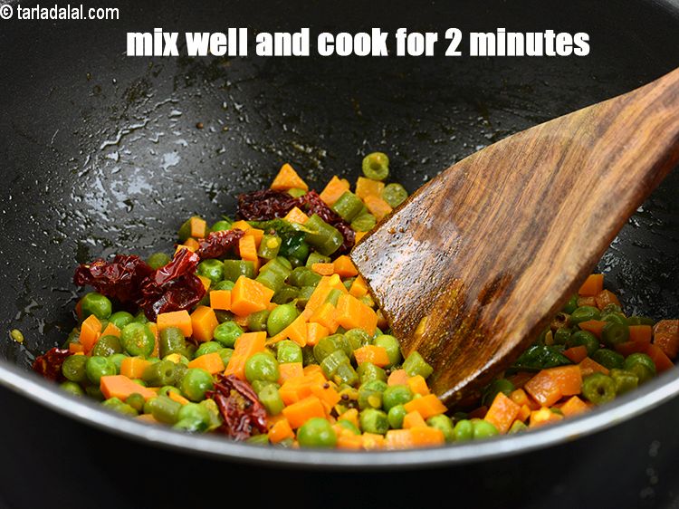 Step 30 – Mix well and cook on a medium flame for 2 minutes, while stirring occasionally.&nbsp;