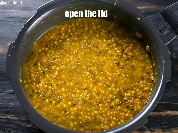 Step 12 – Allow the steam to escape before opening the lid.