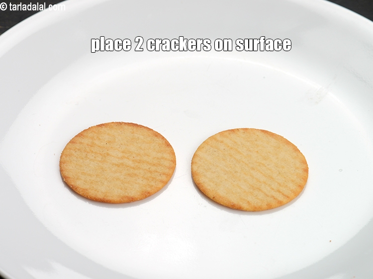 Step 12 – Place 2 crackers on a clean, dry surface.&nbsp;