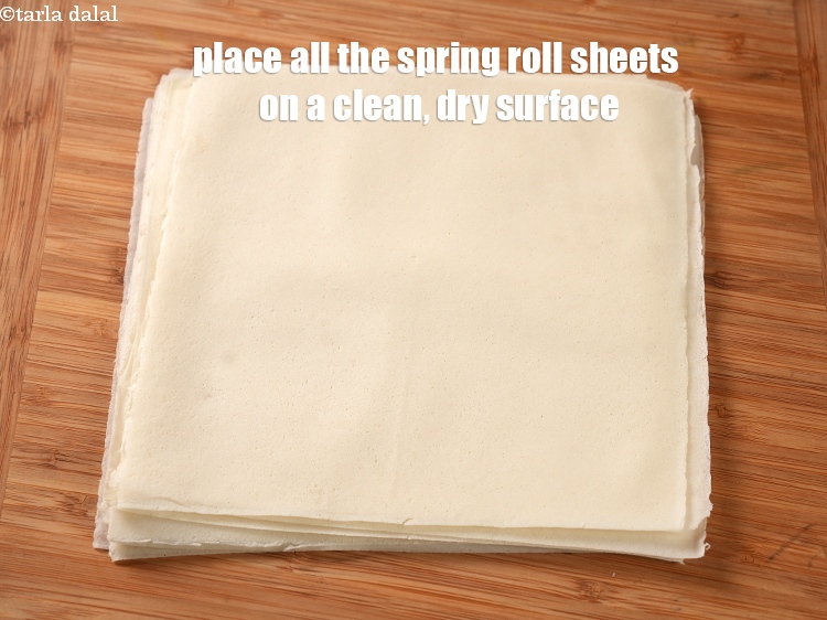 Step 12 – To make threaded paneer, place all the spring roll sheets on a clean, dry surface.