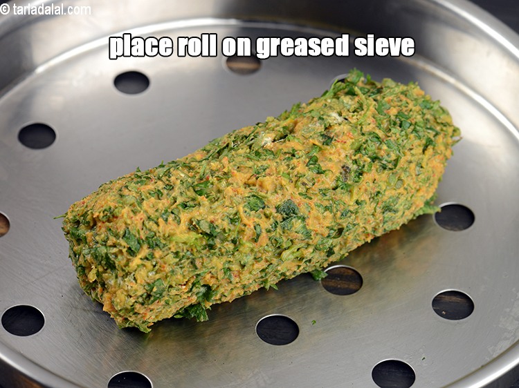 Step 12 – Place the roll on a greased sieve.
