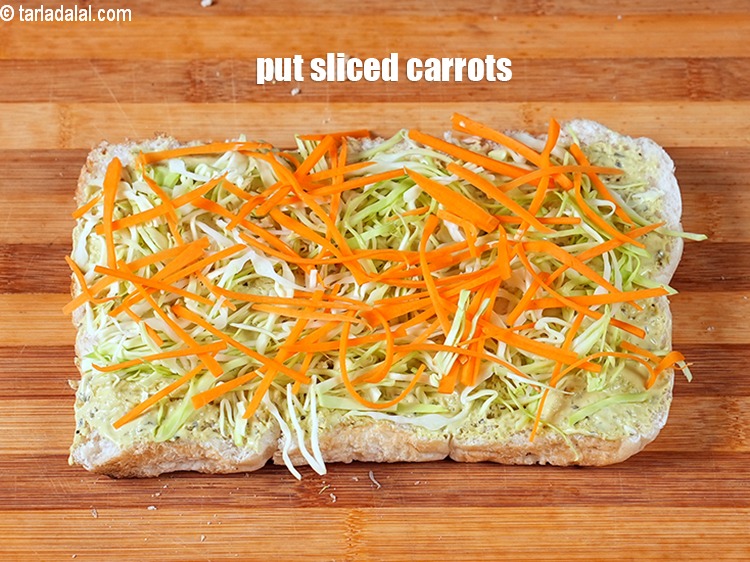 Step 15 – Put &frac14; cup&nbsp;<a href="https://www.tarladalal.com/glossary-sliced-carrots-748i">sliced carrots</a>.
