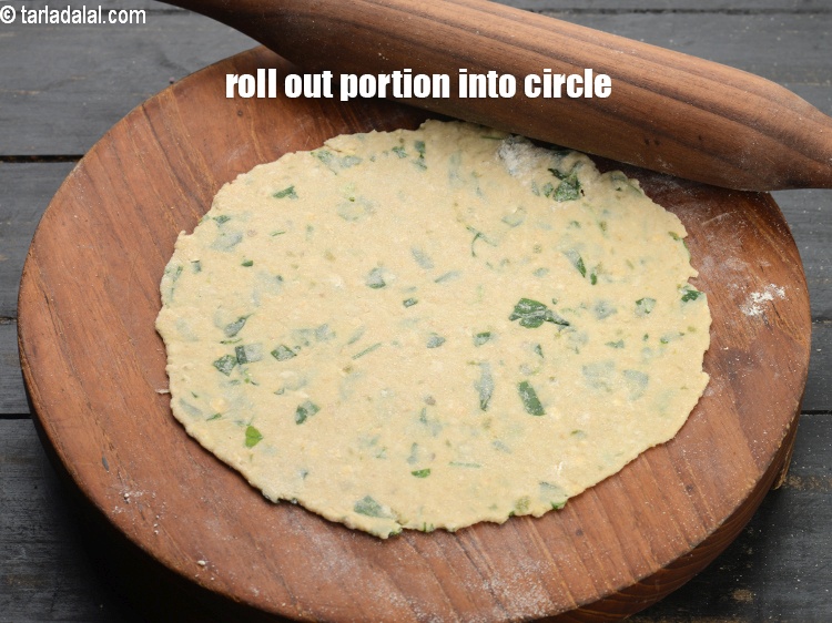 Step 12 – Roll out each portion of the dough into a 175 mm. (7&rdquo;) diameter circle with …