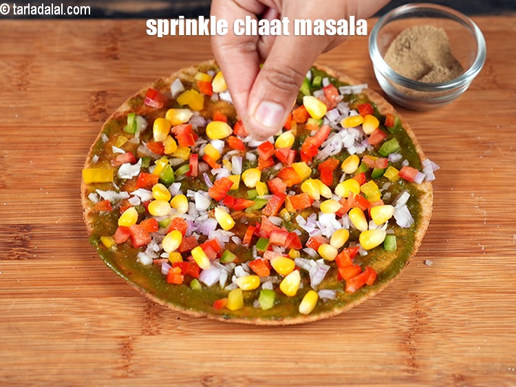 Step 12 – Sprinkle chaat masala.&nbsp;