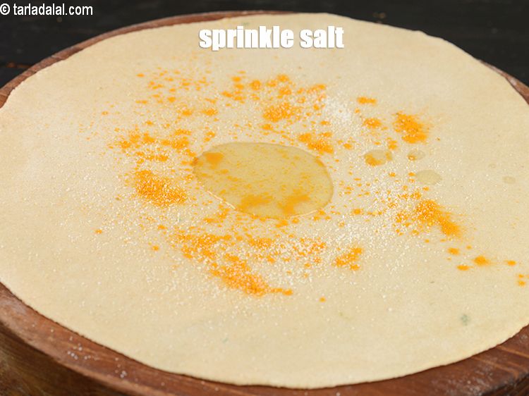 Step 12 – Sprinkle little <a href="https://www.tarladalal.com/glossary-salt-namak-table-salt-418i">salt</a>.