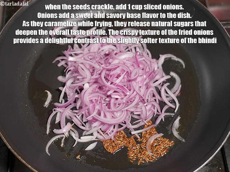 Step 12 – When the seeds crackle, add 1 cup <a href="https://www.tarladalal.com/glossary-sliced-onions-745i">sliced onions</a>. Onions add a sweet and …