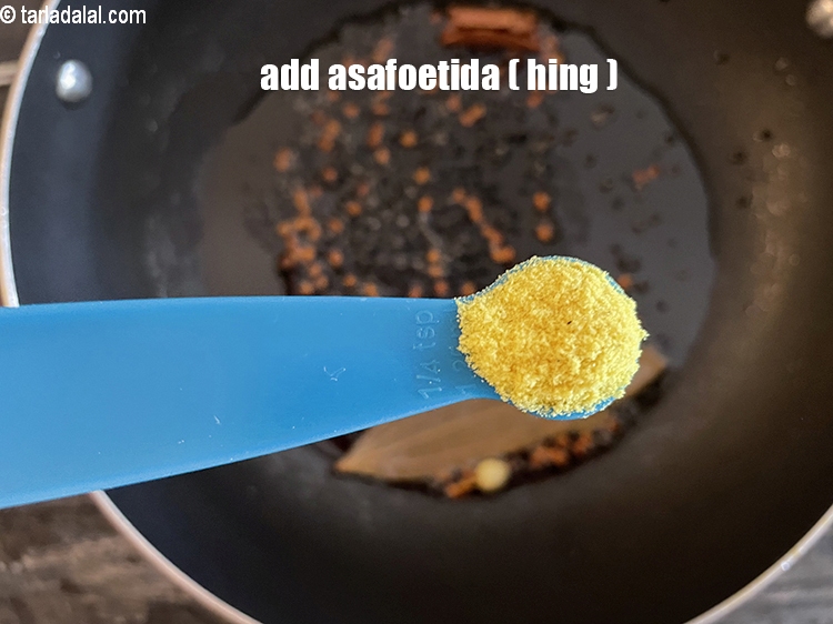 Step 17 – Add&nbsp;<meta charset="UTF-8" />1/4 tsp&nbsp;<a href="glossary-asafoetida-hing-113i">asafoetida (hing)</a>.