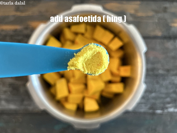 Step 12 – Add&nbsp;<meta charset="UTF-8" />1/4 tsp&nbsp;<a href="glossary-asafoetida-hing-113i">asafoetida (hing)</a>.