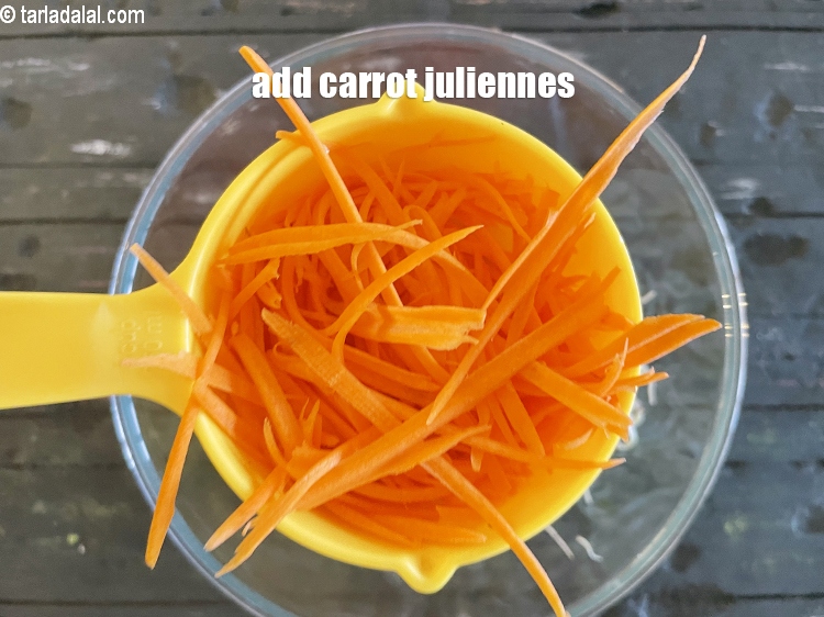 Step 12 – Add&nbsp;<meta charset="UTF-8" />1/2 cup&nbsp;<a href="glossary-carrot-juliennes-754i">carrot juliennes</a>.