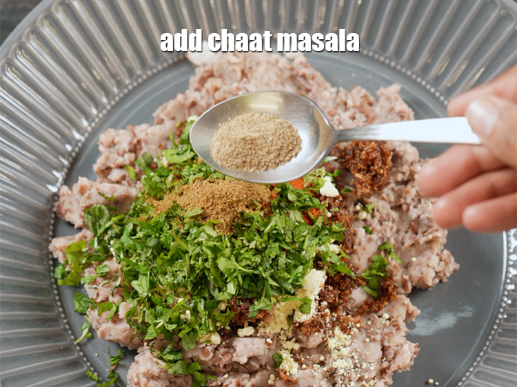 Step 16 – Add &frac12; tsp <a href="https://www.tarladalal.com/glossary-chaat-masala-300i">chaat masala</a>.