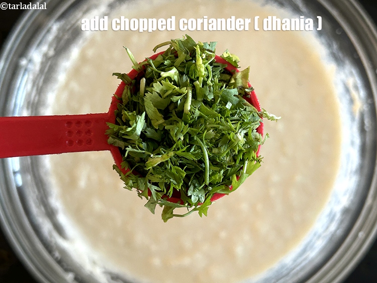 Step 12 – Add 2 tbsp <a href="https://www.tarladalal.com/glossary-chopped-coriander-783i"><strong>chopped coriander (dhania)</strong></a><strong>.</strong>
