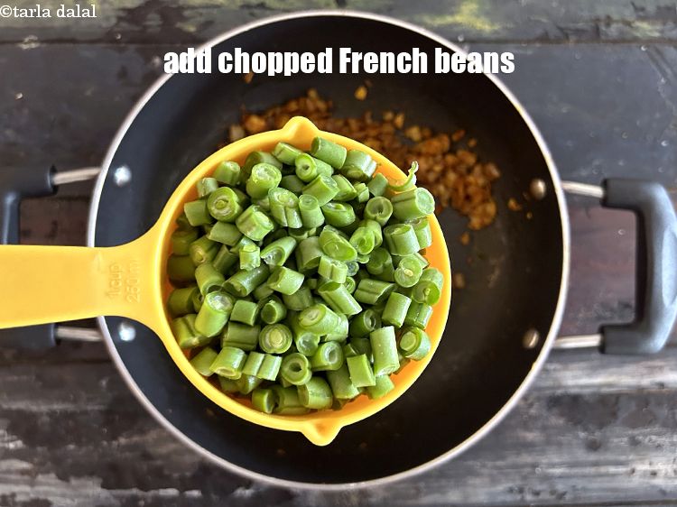 Step 14 – Add&nbsp;<meta charset="UTF-8" />2 cups&nbsp;<a href="glossary-chopped-french-beans-797i">chopped french beans</a>.
