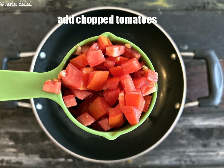 Step 12 – Add&nbsp;<meta charset="UTF-8" />1/2 cup&nbsp;<a href="glossary-chopped-tomatoes-779i">chopped tomatoes</a>.