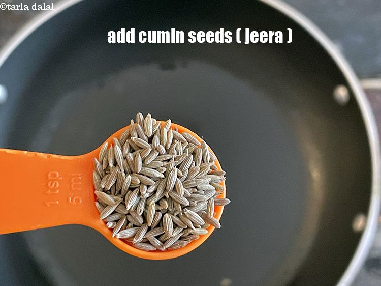 Step 28 – Add&nbsp;<meta charset="UTF-8" />1 tsp&nbsp;<a href="glossary-cumin-seeds-jeera-zeera-381i">cumin seeds (jeera)</a>.