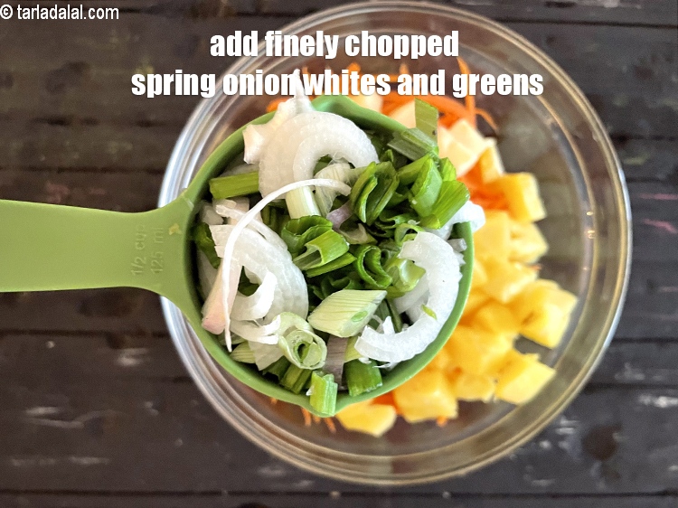 Step 12 – Add 1/2 cup finely chopped spring onion whites and greens.