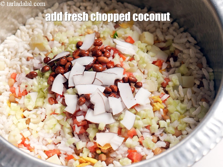 Step 13 – Add 2 tbsp fresh <a href="https://www.tarladalal.com/glossary-chopped-coconut-1278i">chopped coconut</a>.