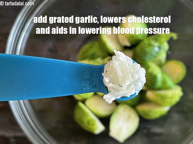Step 12 – Add 1/4th tsp grated garlic.&nbsp;Garlic&nbsp;has been proven to&nbsp;<a href="https://www.tarladalal.com/recipes-for-Low-Cholesterol--380">lower cholesterol</a>.&nbsp;The active ingredient allicin present in …