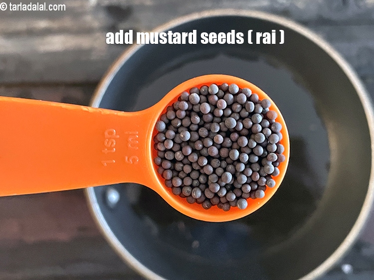 Step 21 – Add&nbsp;<meta charset="UTF-8" />1 tsp&nbsp;<a href="glossary-mustard-seeds-sarson-rai-sarson-ke-beej-525i">mustard seeds ( rai / sarson)</a>.