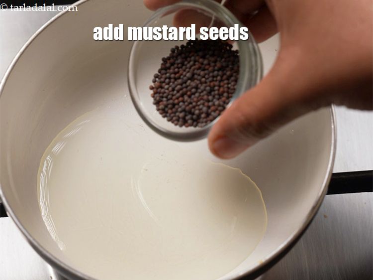 Step 13 – Add 2 tsp <a href="https://www.tarladalal.com/glossary-mustard-seeds-sarson-rai-sarson-ke-beej-525i">mustard seeds ( rai / sarson)</a>.&nbsp;